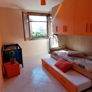 foto che ritrae la camera col doppio letto di Casa Grace Pula