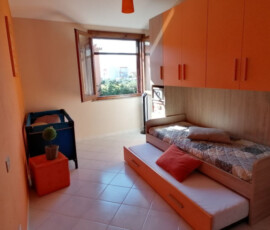 foto che ritrae la camera col doppio letto di Casa Grace Pula